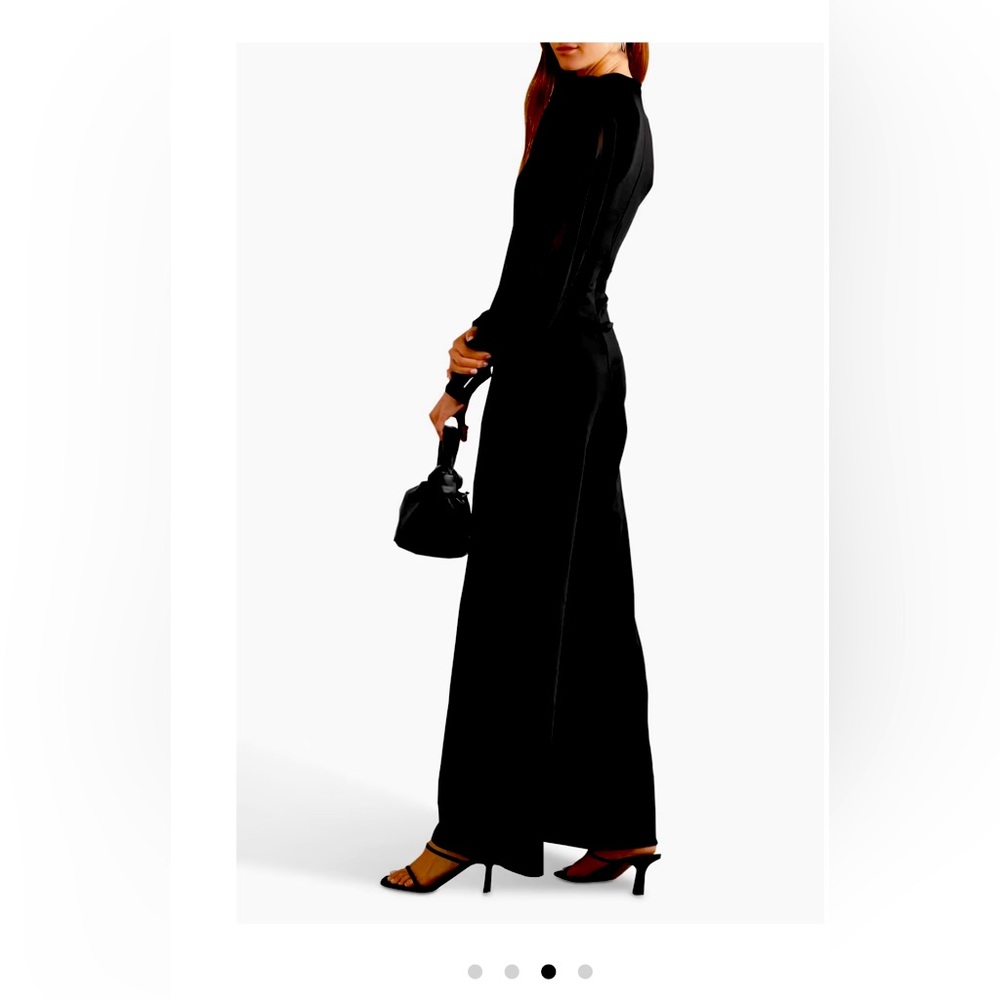 One piece black MARIKA Vera pant suit. Never worn